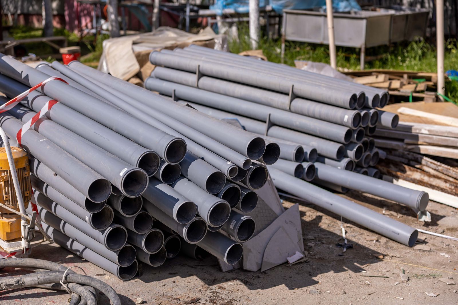 Sewer pipe sections staged for a sewer line repair in New Smyrna Beach